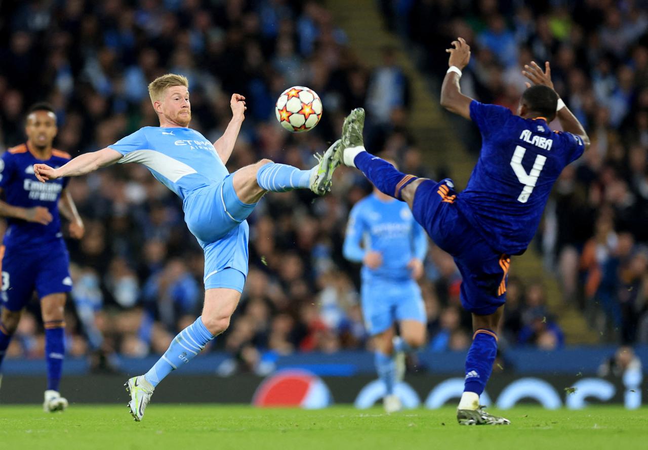 Man City beat Real Madrid 4-3 in Champions League thriller | Reuters